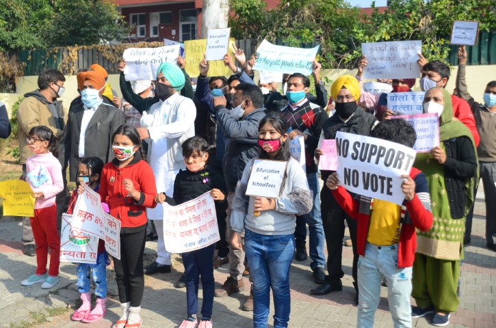 parents of school children protested outside the DEO office