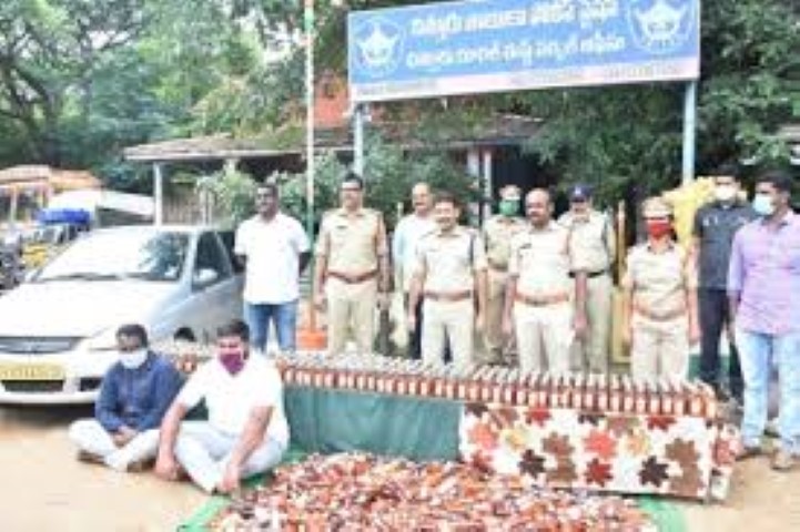 Chittoor police arrest two, seize 1k Karnataka liquor bottles