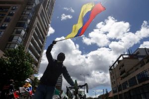 In Colombia protesters march on as talks stall and blockades remain