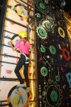 A woman climbs a wall at Woop! Chandigarh entertainment park unveiled in Zirakpur(Mohali).