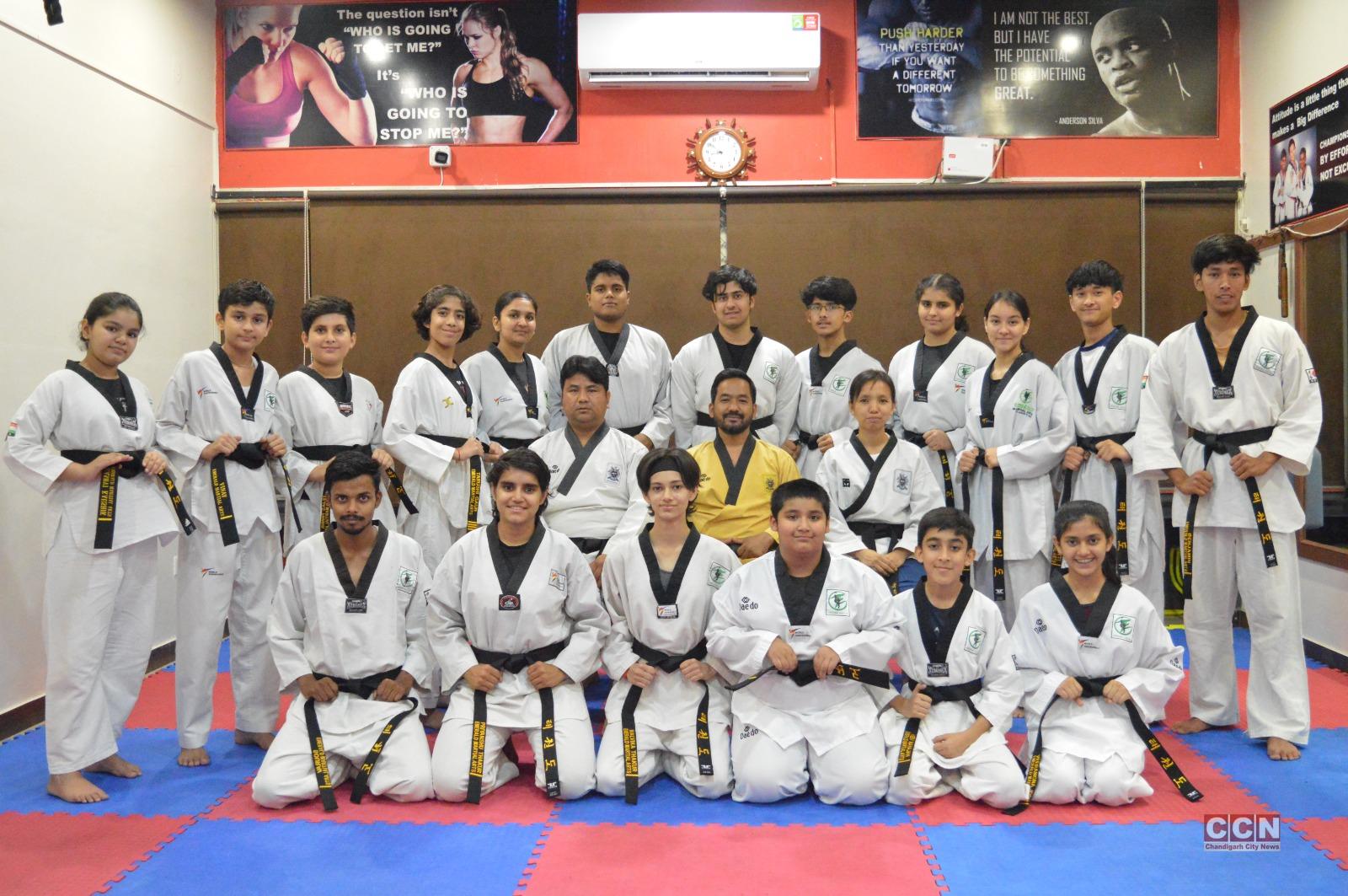 18 martial arts students awarded degrees and belts