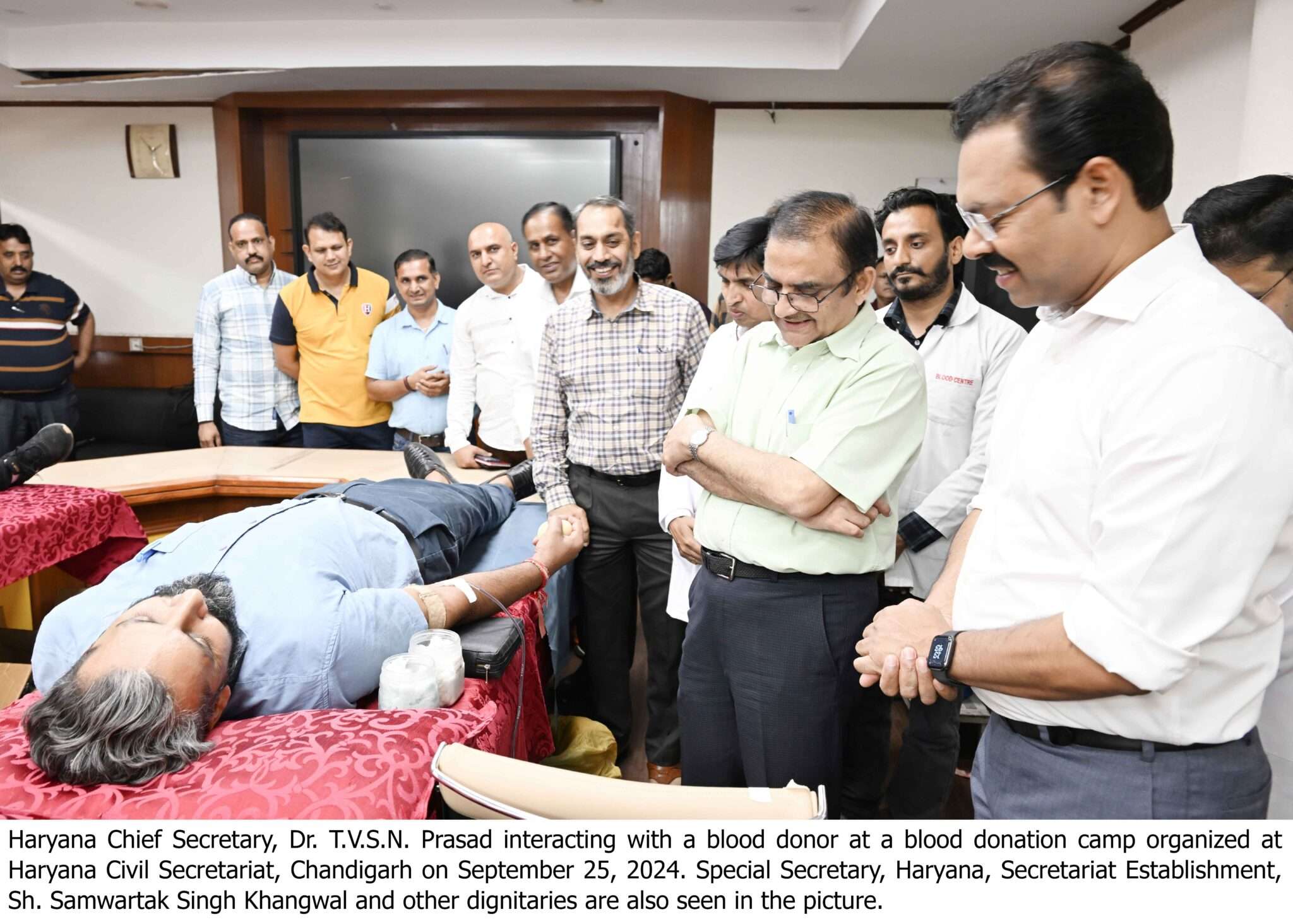 Haryana Chief Secretary, Dr. T.V.S.N. Prasad interacting with blood donor at blood donation camp 